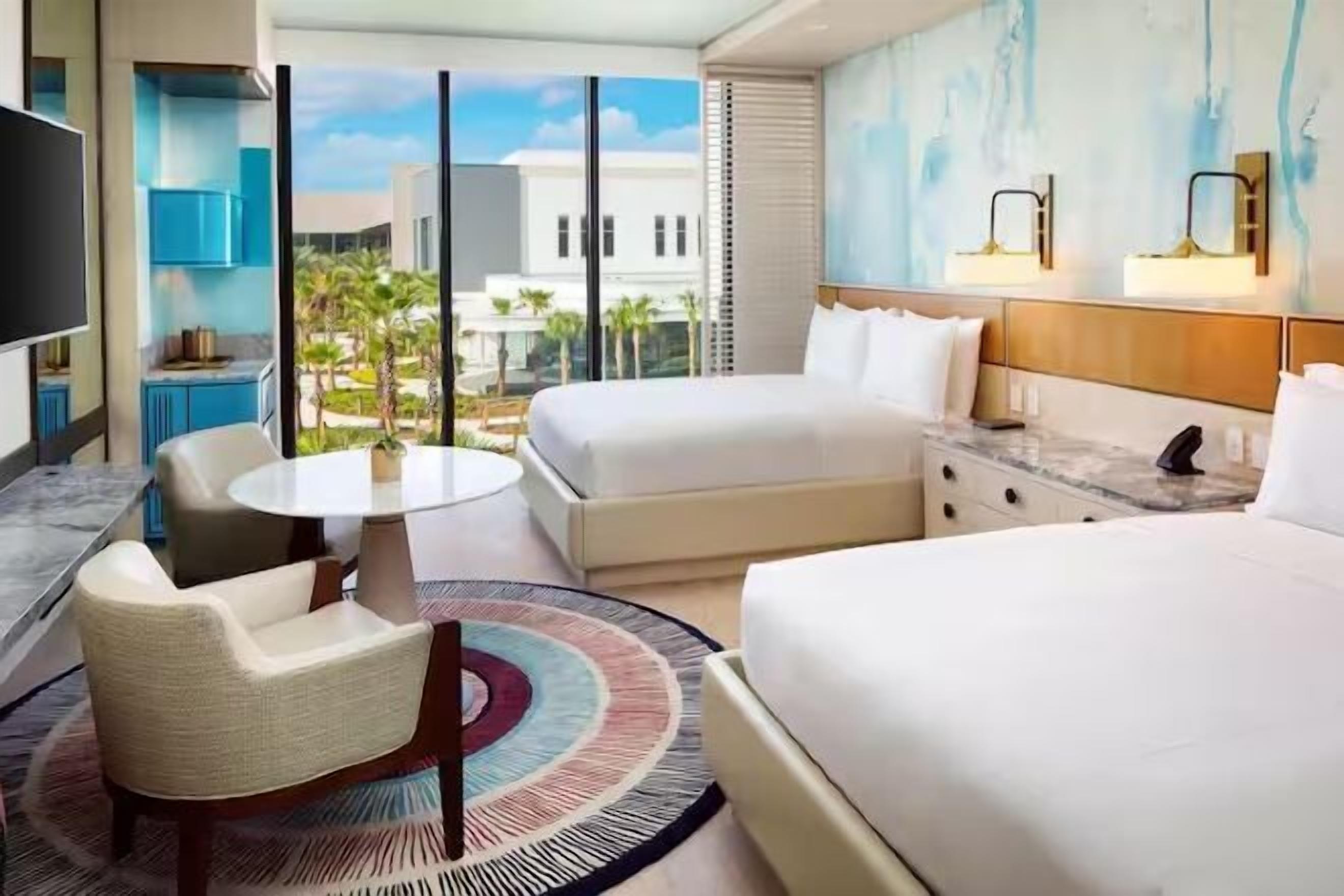 Hypo-allergenic bedding, minibar, in-room safe, desk