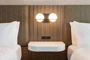 Blackout drapes, iron/ironing board, free rollaway beds, free WiFi