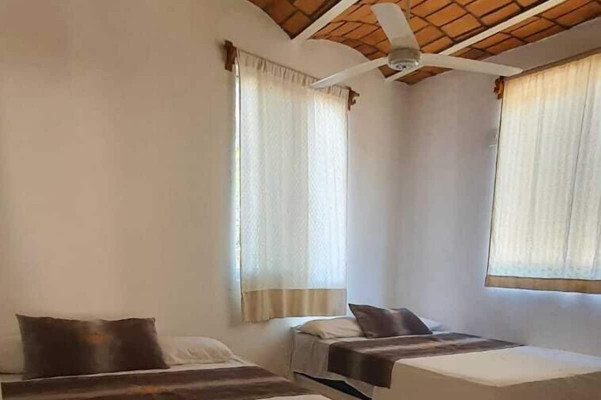 Bungalow Basic, 1 kamar tidur | 1 kamar tidur dan seprai linen