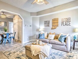 City Chic Townhome Near Downtown | Living area | 65-inch Smart TV with digital channels, TV, Netflix