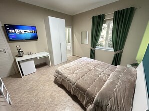 Chambre familiale | Literie hypoallergénique, articles de minibar gratuits, bureau