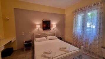 Apartemen | 1 kamar tidur, setrika/meja setrika, Wi-Fi gratis, dan seprai linen