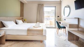 Superior Double Room, Partial Sea View | In-room safe, blackout drapes, free WiFi, bed sheets