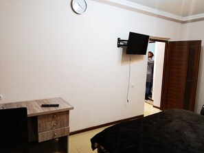 1 slaapkamer, een strijkplank/strijkijzer