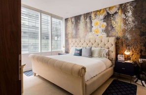 1 slaapkamer, een strijkplank/strijkijzer, wifi, beddengoed