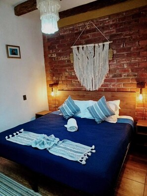 Deluxe Room, 1 Bedroom | Premium bedding, down duvets, individually decorated, soundproofing - Suites del Barrio Hotel (San Cristóbal de las Casas)