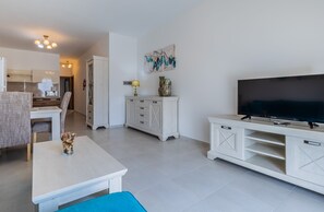 Appartement, plusieurs lits | Coin séjour