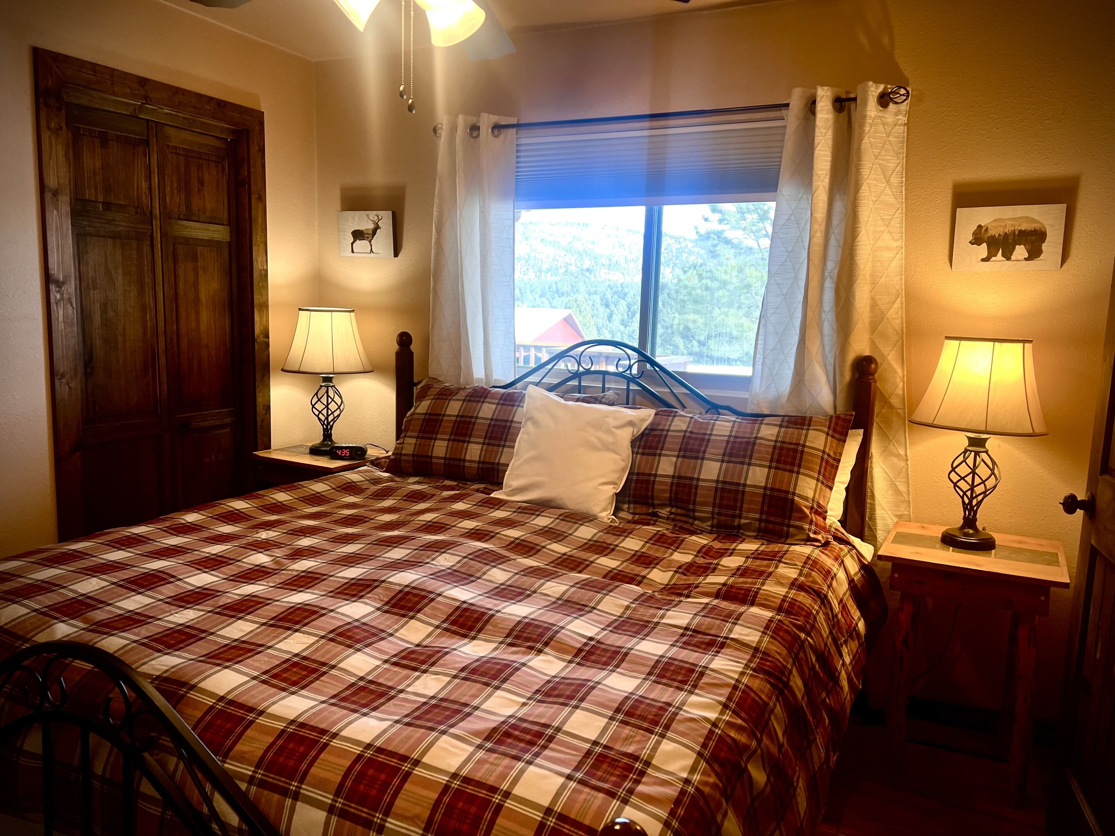 Bedroom 2 has a king-sized bed with views of the ski runs.