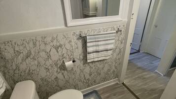 Hair dryer, towels, soap, shampoo