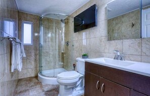 Shower, hair dryer, towels, soap