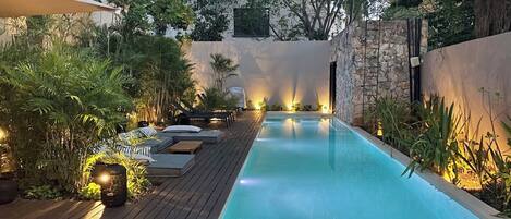 Outdoor pool, pool umbrellas, sun loungers