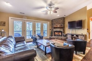 Smart TV, fireplace, DVD player, foosball