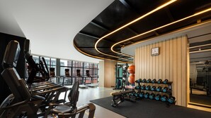 A modern gym with treadmills, dumbbells, and exercise equipment. - Four Points by Sheraton Chongqing, Yongchuan (Chongqing)