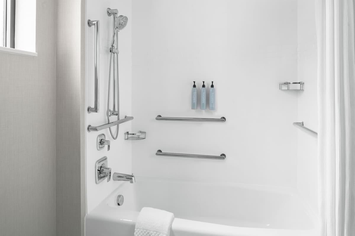 Rainfall showerhead, designer toiletries, hair dryer, towels