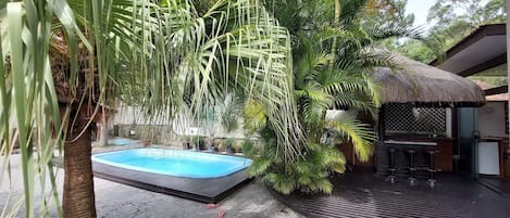 Casa Premium, acceso a la alberca, vista al jardín | Vista al jardín