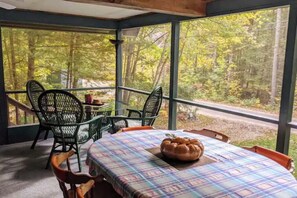 Outdoor dining - Four Bedroom Lakehouse on Winnepesaukee. Waterview, beach, and lots of parking. (Moultonborough)