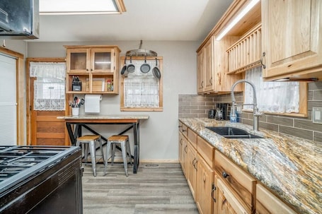 Fridge, microwave, oven, stovetop. 2 Bed 1 Bath Home w/2 Car Garage & Fenced Yard