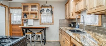 2 Bed 1 Bath Home  w/2 Car Garage & Fenced Yard