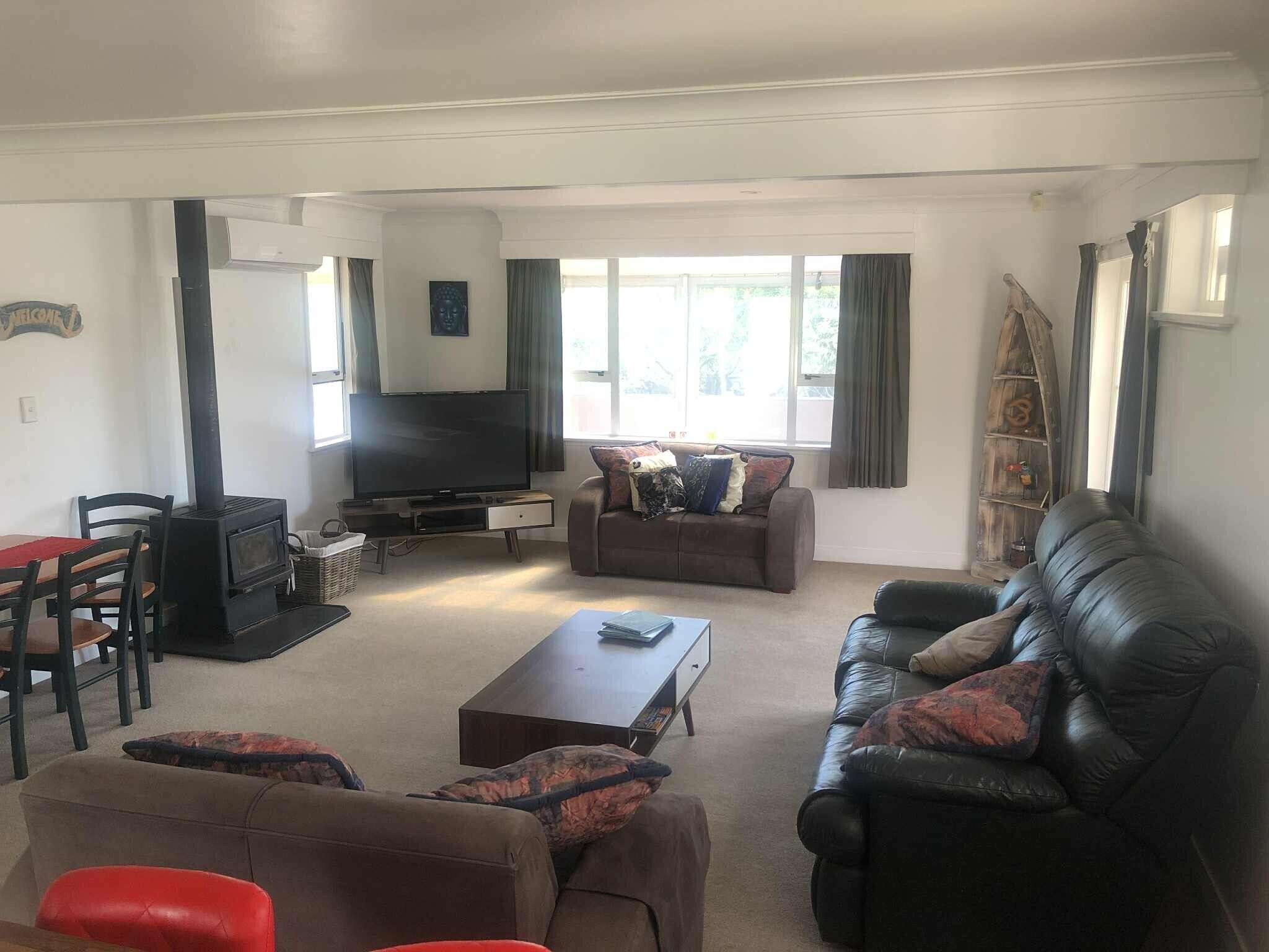 Smart TV, fireplace, DVD player, books