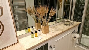 Shower, hair dryer, towels, soap