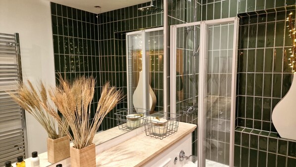 Shower, hair dryer, towels, soap