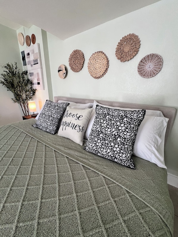 1 bedroom, desk, iron/ironing board, travel crib