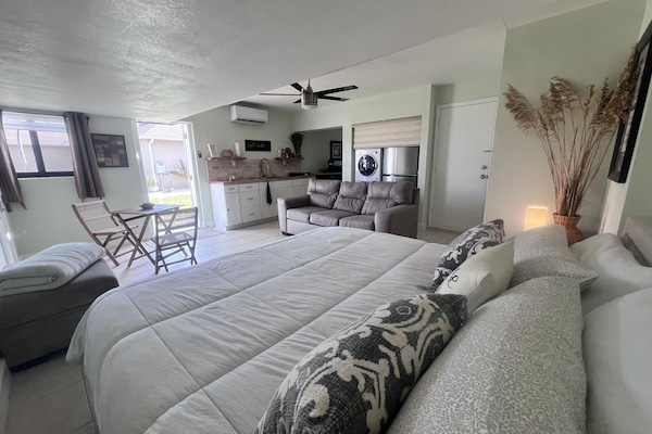 1 bedroom, desk, iron/ironing board, travel crib