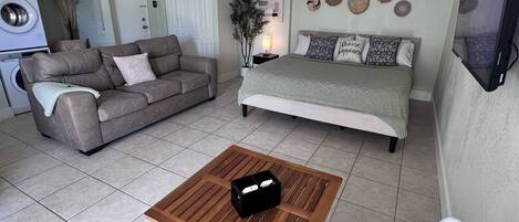 1 bedroom, desk, iron/ironing board, travel crib