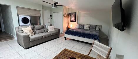 1 bedroom, desk, iron/ironing board, travel crib