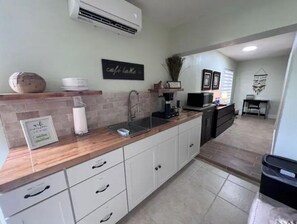 Fridge, microwave, coffee/tea maker, toaster