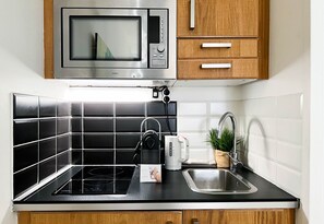 Fridge, microwave, coffee/tea maker, electric kettle