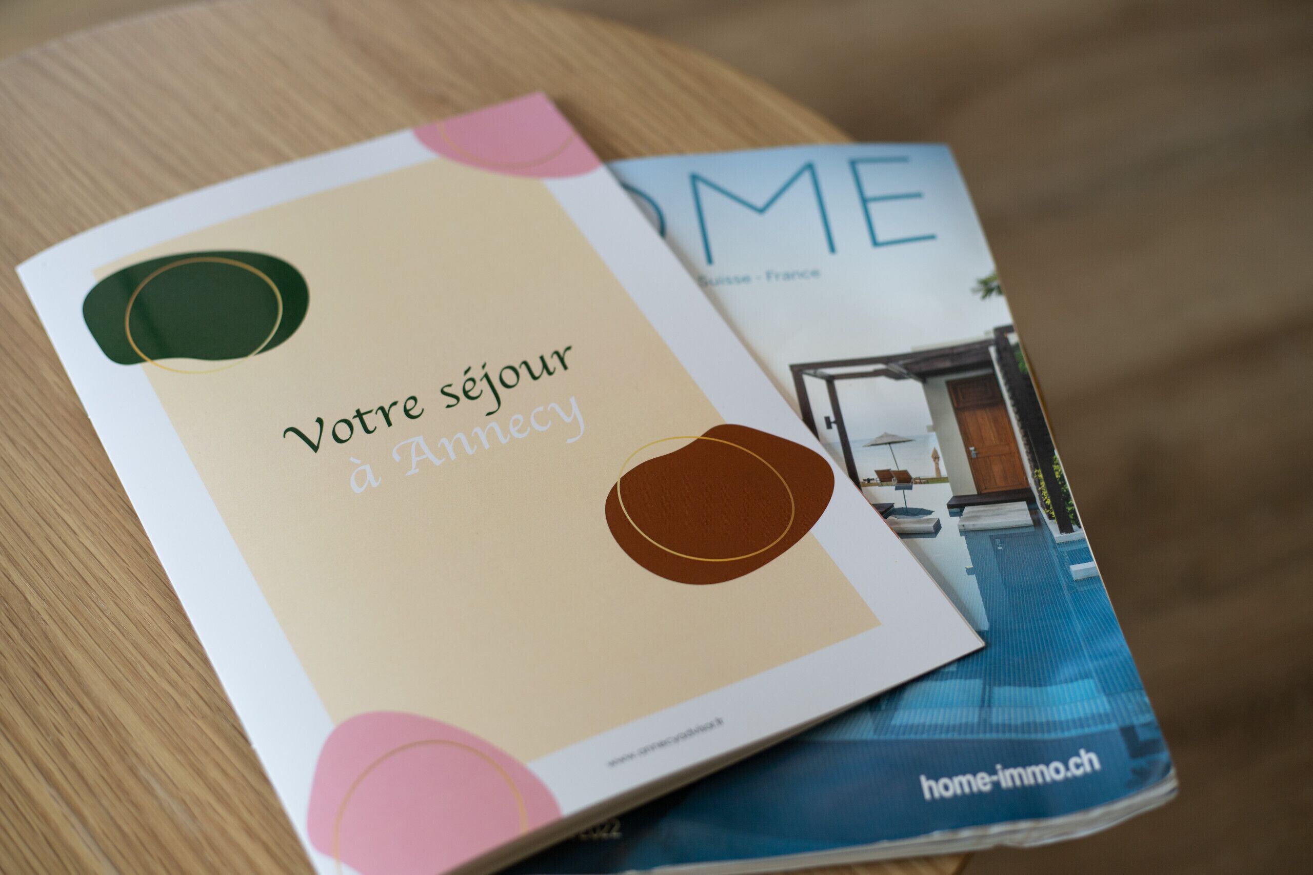 A brochure with text and a photo of a room.