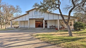 A two-story house with a covered driveway and a patio area. - Georgetown Barn Studio on > 7 Acres: Pet Friendly! (Georgetown)