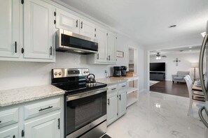 Fridge, microwave, oven, stovetop - The Nest-Cozy 4BR in the heart of town w/ fire pit (Fort Smith)