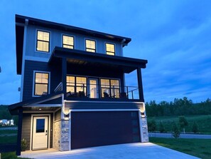 Waterfront rental near Spirit Mountain with a 2nd-floor balcony overlooking the St. Louis River.