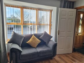 House, 3 Bedrooms | Living area | Flat-screen TV