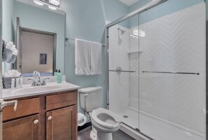 Shower, hair dryer, towels