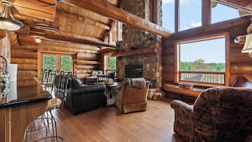 TV connectée, cheminée, table de tennis de table