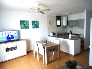 Fridge, microwave, coffee/tea maker, cookware/dishes/utensils