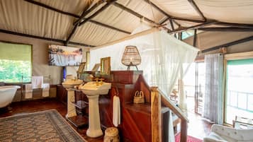 Superior Tent, 1 Bedroom, River View | Bathroom | Separate bathtub and shower, rainfall showerhead, designer toiletries