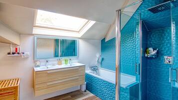 Shower, hair dryer, towels, toilet paper