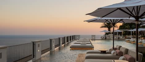 2 outdoor pools, pool umbrellas, sun loungers