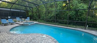 Exceptional 5 bedroom home, gated community, less than 30 mins from attractions.