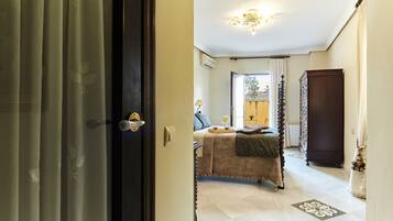 2 dormitorios, tabla de planchar con plancha, wifi gratis y ropa de cama