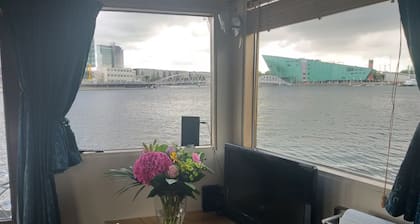 Boat with a view in center of Amsterdam