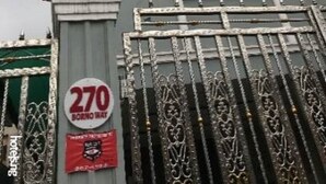 A hotel entrance with a green sign, a number 270 sign, and a decorative gate. - Coolio Hotel & Suites (Lagos)
