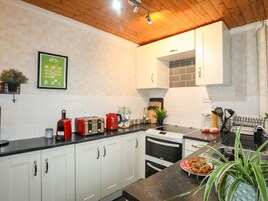 Fridge, electric kettle, toaster, cookware/dishes/utensils