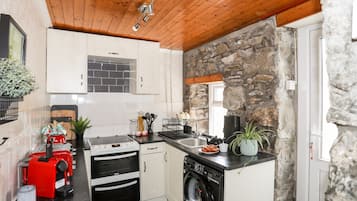 Fridge, electric kettle, toaster, cookware/dishes/utensils