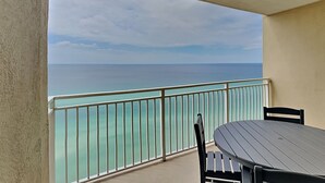 A balcony with a view of the ocean. - Emerald Beach #1825 | Dining, Pool, Gym, & More! (Panama City Beach)
