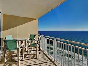 Outdoor dining - Emerald Beach #2435 | Stunning Views + Resort Amenities! (Panama City Beach)